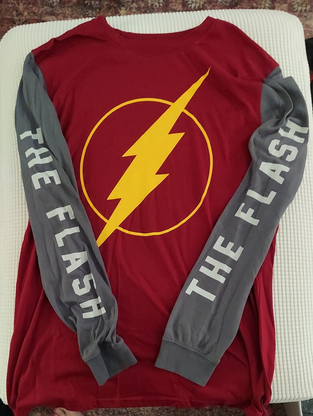 Maroon Long-Sleeve Graphic Shirt with Yellow Lightning Emblem and Gray Sleeves